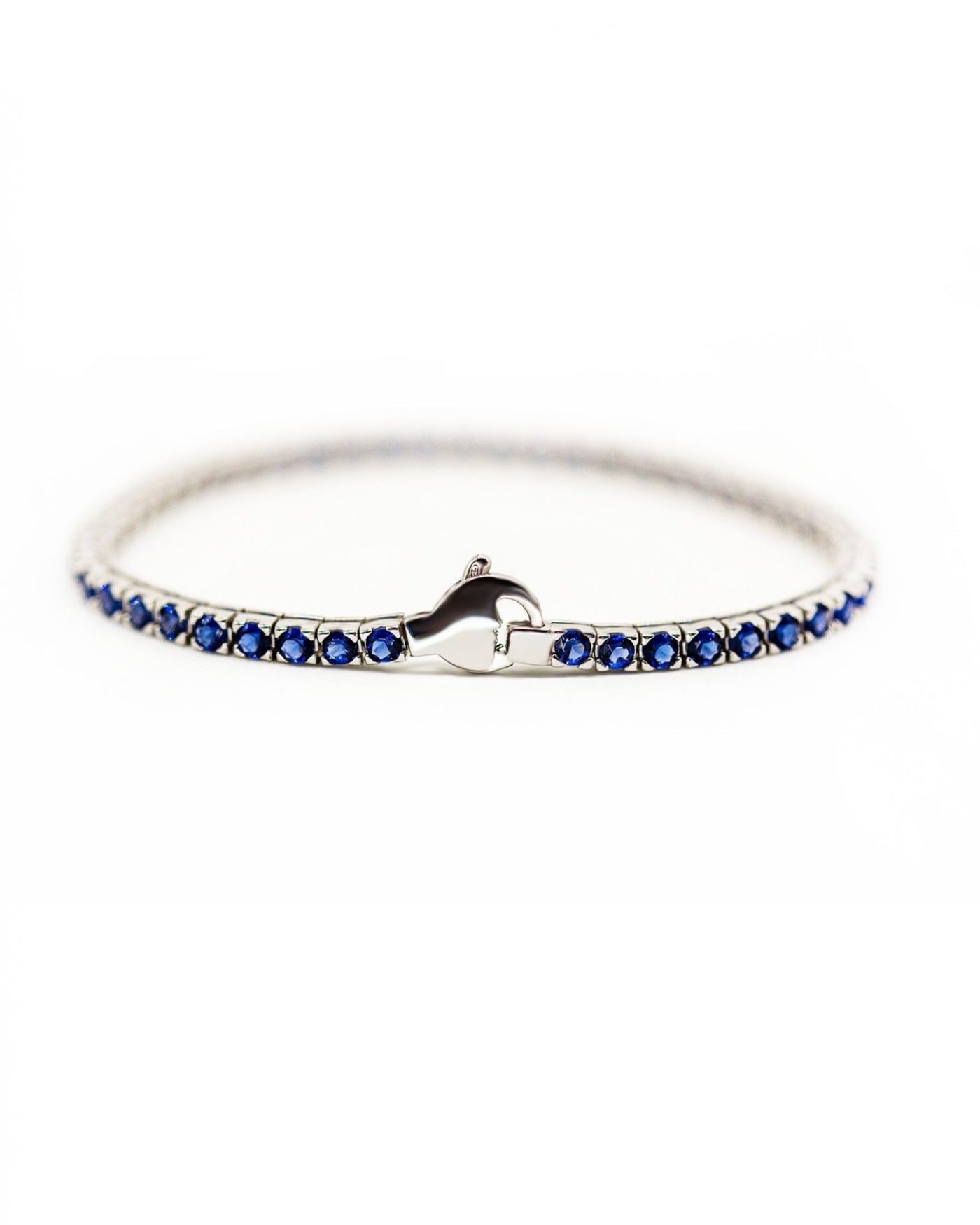 Silbernes, rhodiniertes Tennisarmband mit blauen Zirkonen  - 2