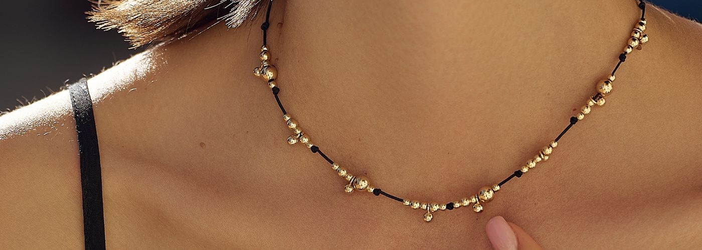 Jewelry with golden spheres - Leis Jewelry